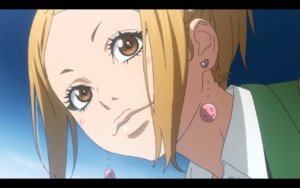 Orange First Impressions: A close-up of Azusa's face.