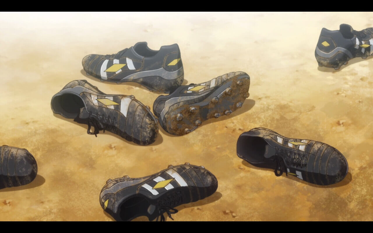 Orange Episode 3 Review Soccer cleats littering the ground.