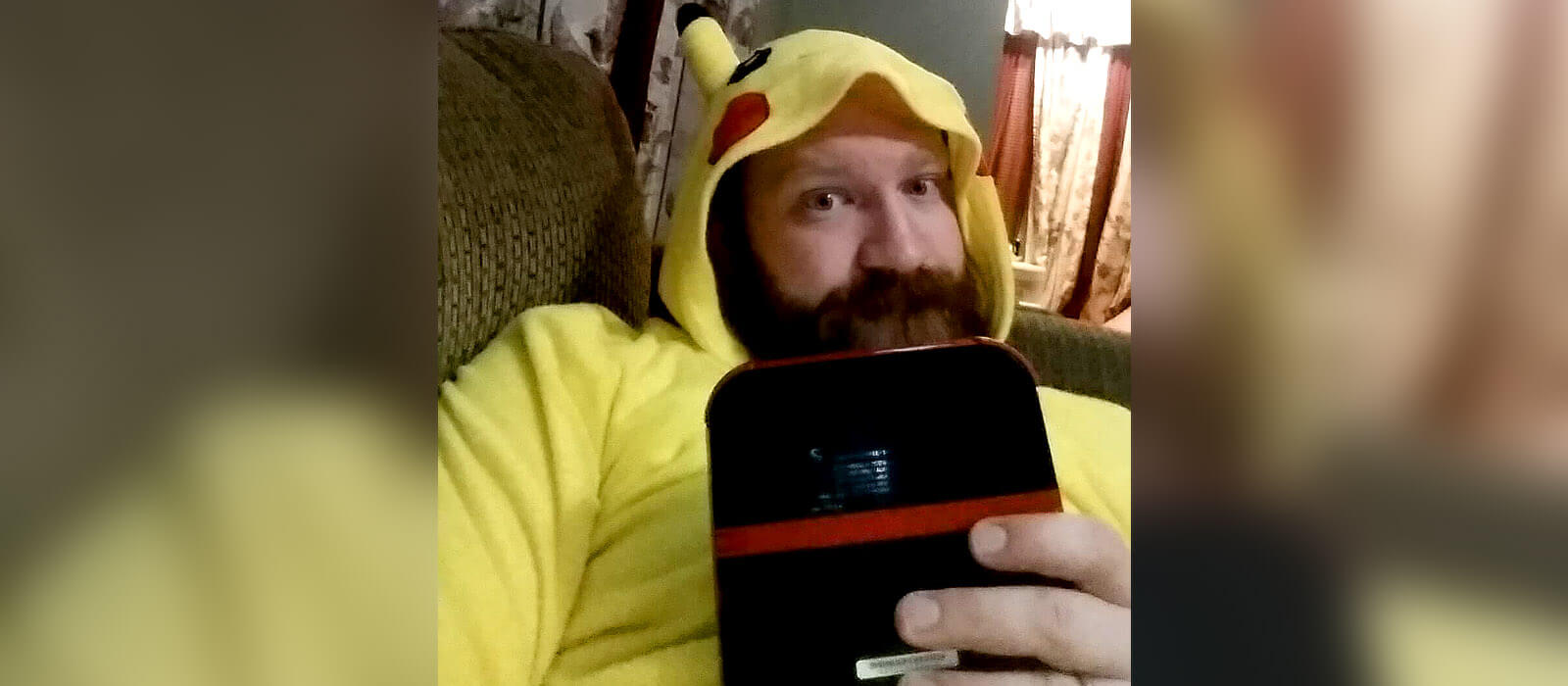 Me in my union suit (Kigurumi) playing Pokemon Moon.