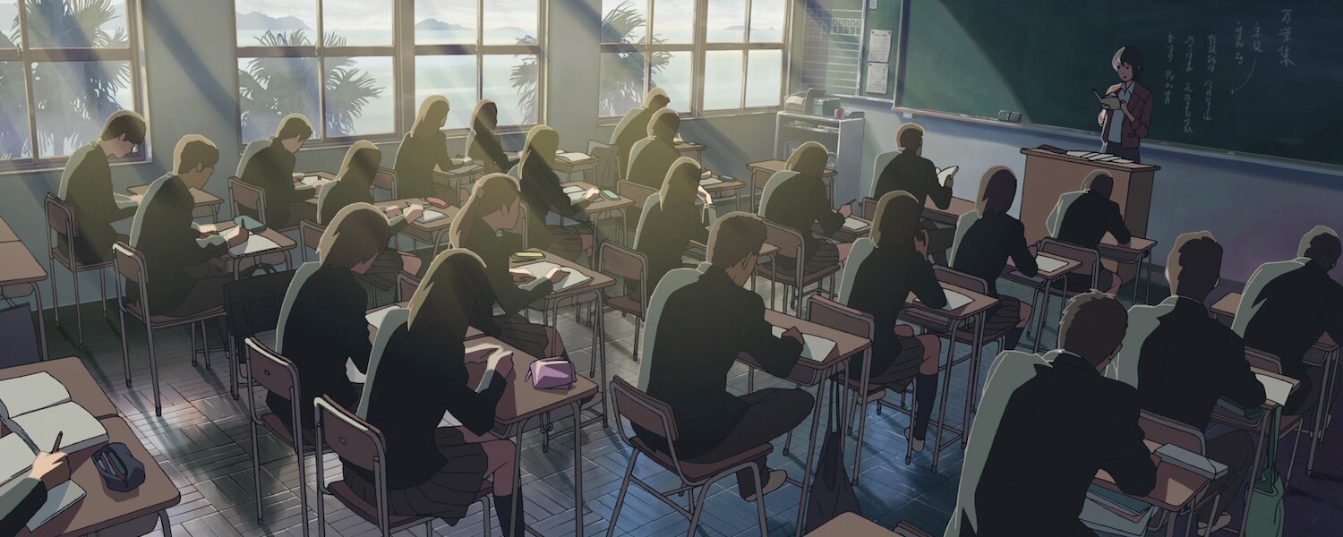 Back to School Advice for Anime Fans Students doing classwork while the teacher stands in front of the chalkboard.