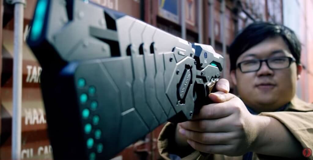 The character of Joe holding the 45MW.TRG Dominator from “Psycho Pass”