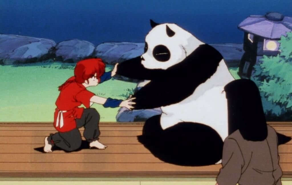 Ranma (as a woman) and Genma (as a panda) get into a physical argument