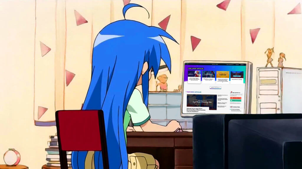 Konata sitting at her computer looking that the Yatta-Tachi 3.0 website!