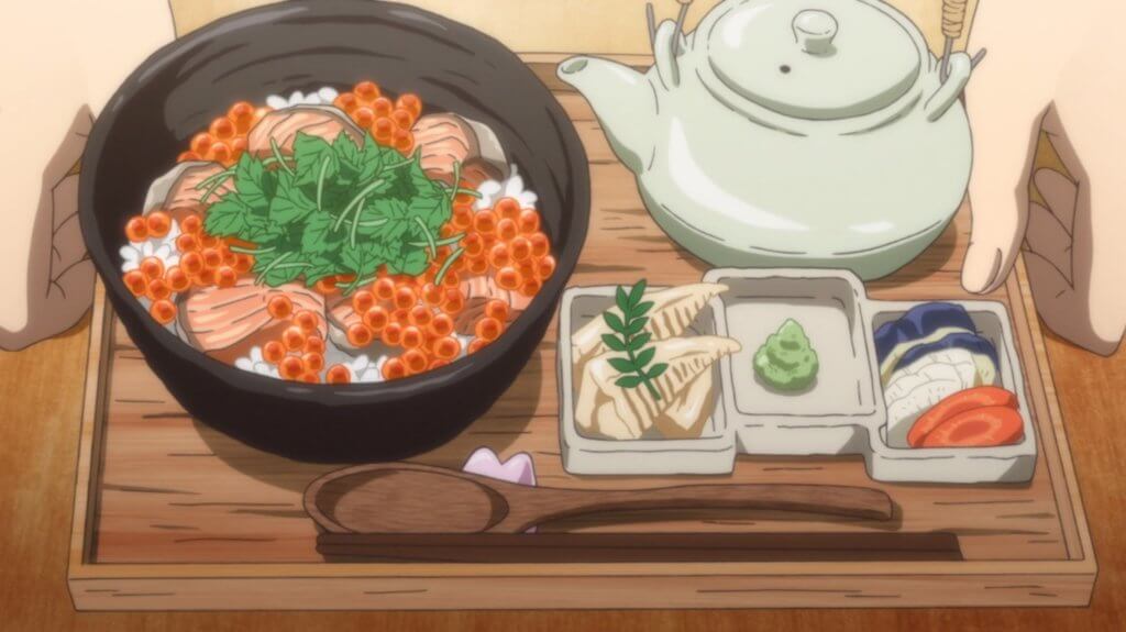 A tray of rice bowl and a pot of tea, with an assortment of side dishes.