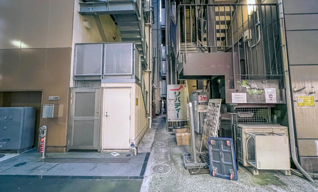 Behind buildings which leads to a narrow alley in Akihabara