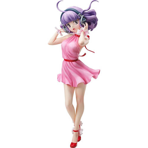 Creamy Mami wearing a pink dress and headphones.