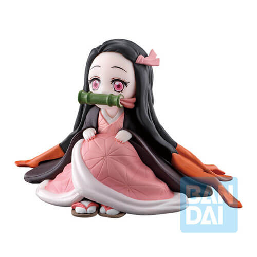 Sitting scrunched up, Nezuko can be seen looking up innocently at you.
