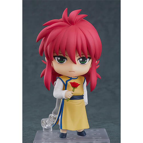 Kurama small figurine holding a red rose and frowning slightly.