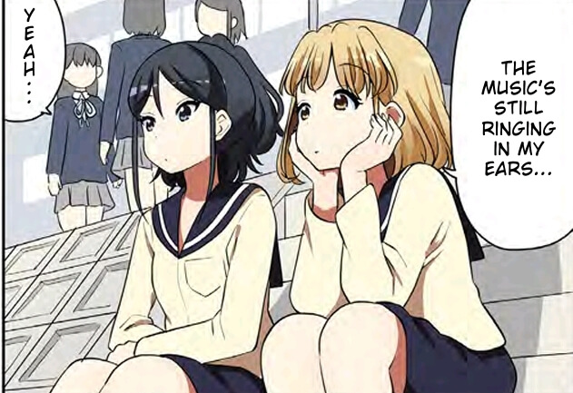 Main characters Yukari and Kaede sit on stairs and discuss the concert they just saw. Yukari is saying "The music's still ringing in my ears".