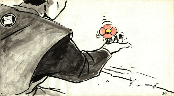 Person is reaching towards a flower floating in water.