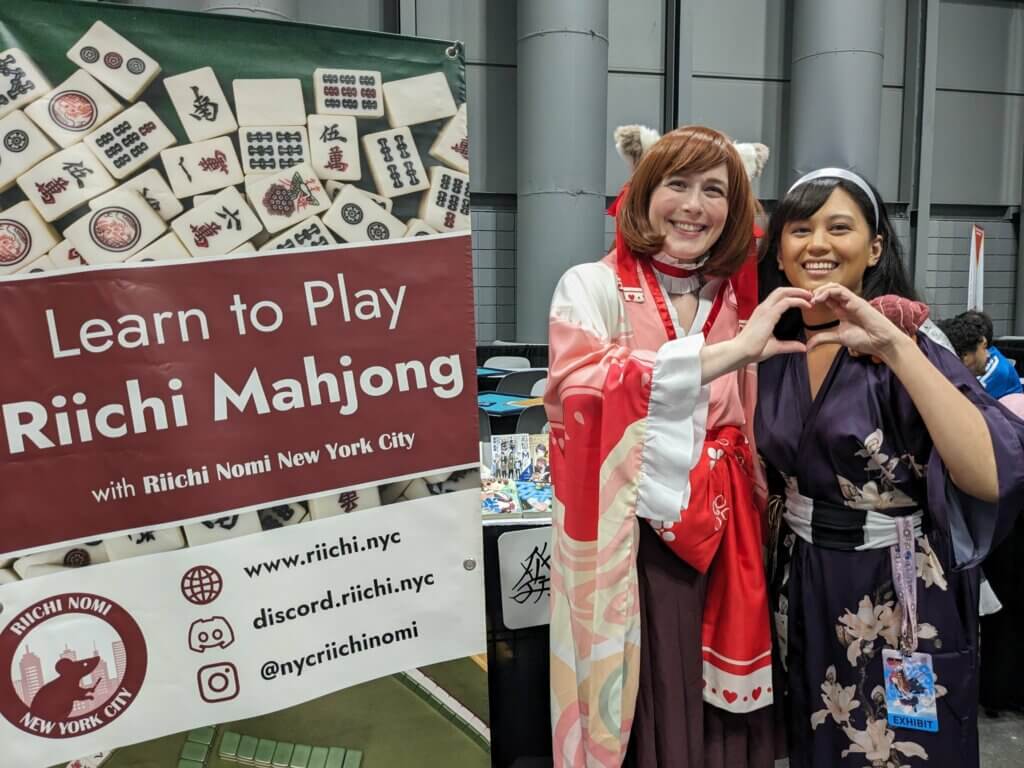 Claire Pozniak and a fellow Riichi Nomi NYC member cosplaying Mahjong Soul characters at Anime NYC 2023.