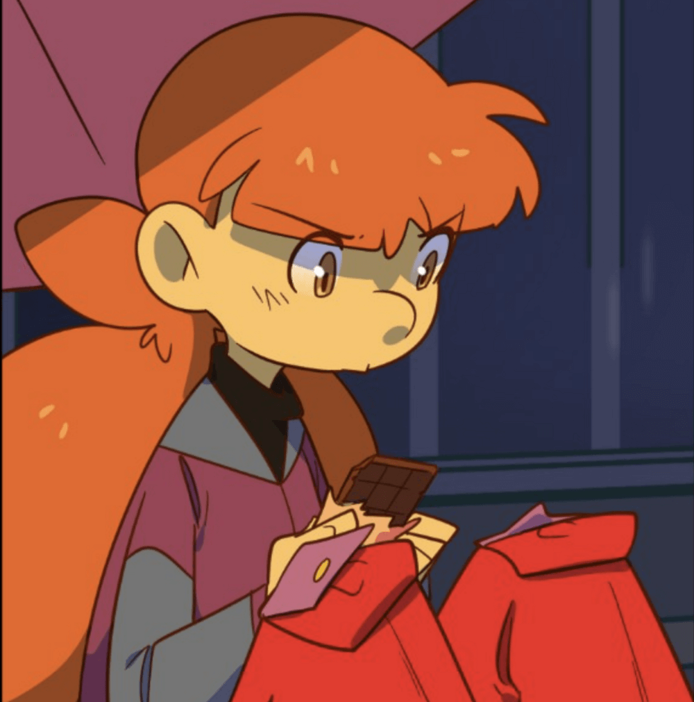 in four leaf, a teenager with long orange hair in two big pigtails (lupe) eats a chocolate bar under a pink umbrella. lupe has an intent expression on their face. they are wearing a purple and grey shirt and red pants.