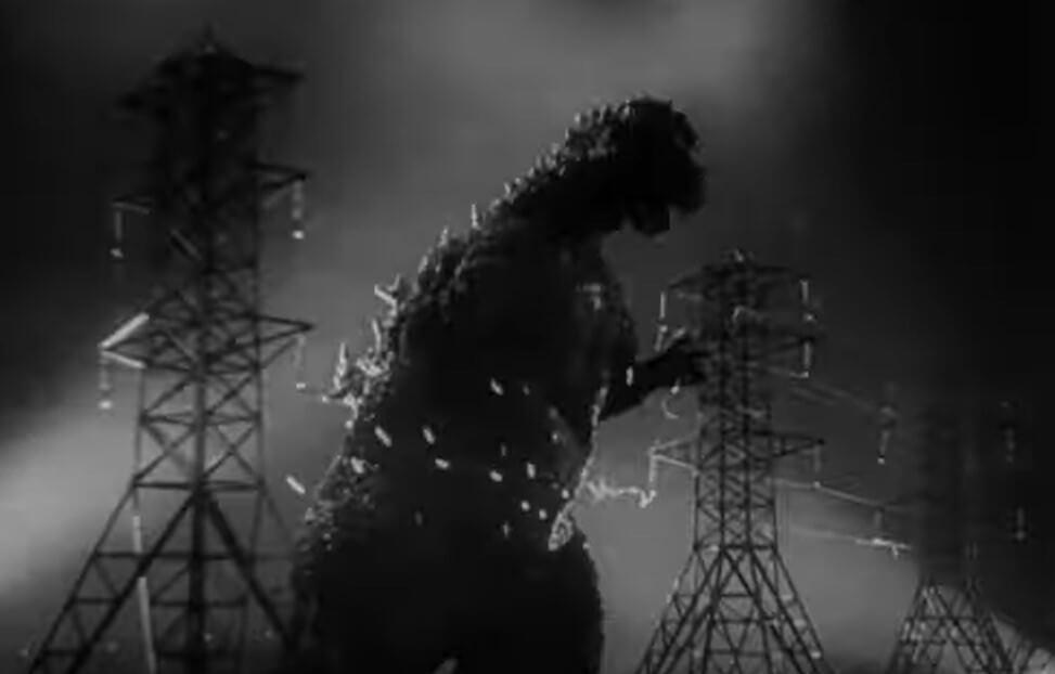 Godzilla destroys electric towers in the 1954 Godzilla black and white movie.