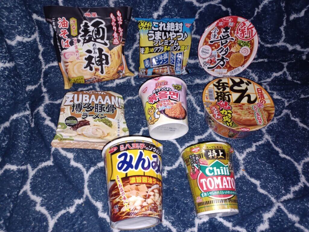 Eight packages of Japanese ramen, including Zubaaan, Chili Tomato, and more.