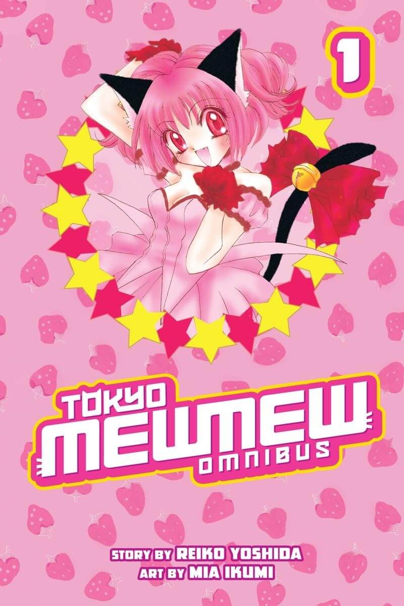 The cover of Tokyo Mew Mew Omnibus. A girl with black car ears poses like a lucky cat. She has a black tail that has a red ribbon and a bell on it. She is wearing a pink strapless dress and red gloves. She has short pink hair and red eyes. She is surrounded by a ring of pink and yellow stars. The background is also pink, and has a pattern of strawberry stamps.