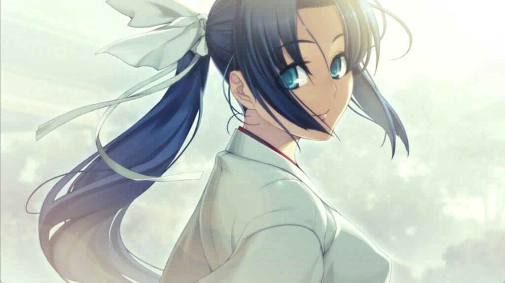 A woman wearing a white robe and a ponytail turns to look at the audience.