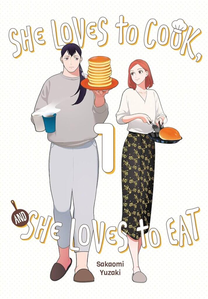 The cover of She Loves to Cook, She Loves to Eat, featuring two women walking together. One is holding a steaming mug and plate of pancakes, while the other is cooking bread in a pan.