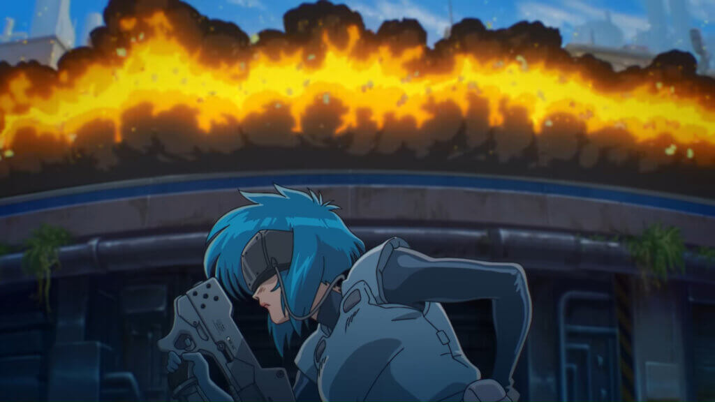 Motoko Kusanagi poses while the bridge behind her explodes into flames.