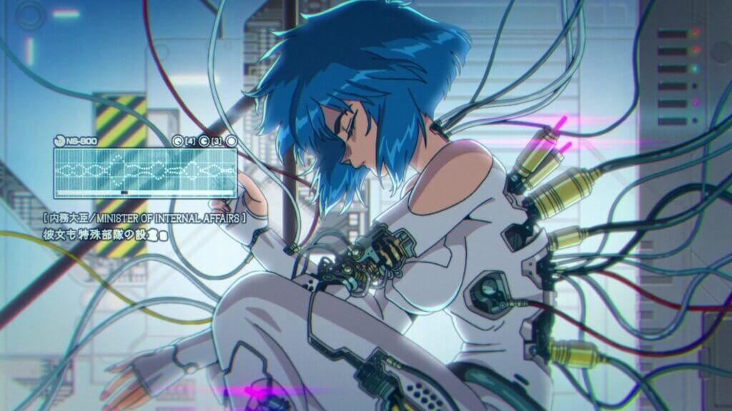 Motoko Kusanagi hunches over in a sitting position with her eyes closed. Her body is connected to dozens of wires.
